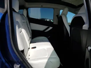 2022 Tesla Model Y Long Range z VIN 7SAYGDEE2NF358366, wystawiony jako Copart lot #50771255 z przebiegiem 73 554 mil mil oraz Szkoda całkowita • Salvage title. Historia ofert i sprzedaży dostępna na DreamBid. Obrazek 11.
