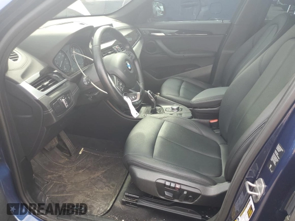 2021 BMW X1 xDrive28i with VIN WBXJG9C0XM5U47141, listed as a Copart auction lot 60645865 with 56,106 mi miles and Salvage title. Bid and sale history available at DreamBid. Image 7.