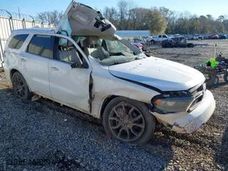 2016 Dodge Durango Limited with VIN 1C4RDHDG3GC424296, listed as a IAAI auction lot 41359675 with 141,000 mi miles. Bid and sale history available at carsss.com. Image 1.