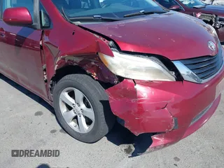 2012 Toyota Sienna LE AAS with VIN 5TDKK3DC6CS234136, listed as a IAAI auction lot 42064491 with 103,925 mi miles. Bid and sale history available at carsss.com. Image 6.