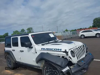 2023 Jeep Wrangler Rubicon z VIN 1C4JJXR64PW586405, wystawiony jako IAAI lot #42318989 z przebiegiem 26 493 mil mil oraz . Historia ofert i sprzedaży dostępna na DreamBid. Obrazek 1.