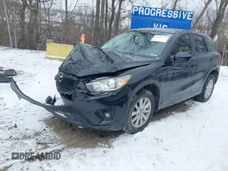2014 Mazda CX-5 Touring with VIN JM3KE4CY8E0416590, listed as a IAAI auction lot 41619713 with 225,156 mi miles. Bid and sale history available at carsss.com. Image 2.