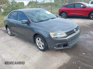 2014 Volkswagen Jetta TDI with VIN 3VWLL7AJ0EM386019, listed as a IAAI auction lot 42229260 with 122,858 mi miles and . Bid and sale history available at DreamBid. Image 1.