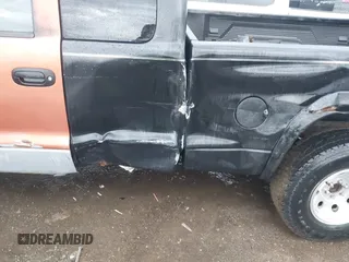 2002 Dodge Dakota z VIN 1B7GG32X22S634407, wystawiony jako IAAI lot #41891953 z przebiegiem 222 595 mil mil oraz . Historia ofert i sprzedaży dostępna na DreamBid. Obrazek 6.