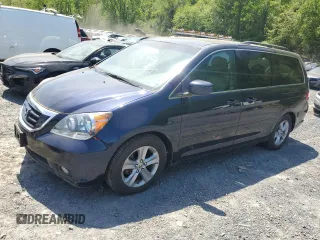 2008 Honda Odyssey Touring z VIN 5FNRL38978B099190, wystawiony jako Copart lot #55905235 z przebiegiem 135 559 mil mil oraz Szkoda całkowita • Salvage title. Historia ofert i sprzedaży dostępna na DreamBid. Obrazek 1.