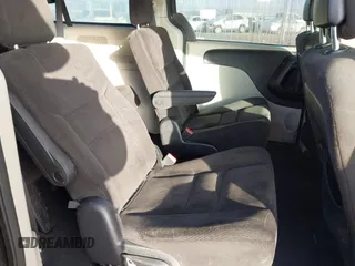 2014 Dodge Grand Caravan SXT with VIN 2C4RDGCG2ER267358, listed as a IAAI auction lot 41001692 with 186,763 mi miles and . Bid and sale history available at DreamBid. Image 8.