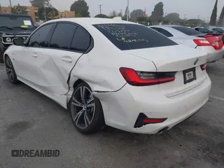 2022 BMW 3 Series 330e with VIN 3MW5P7J04N8C40865, listed as a IAAI auction lot 41635704 with 44,929 mi miles. Bid and sale history available at carsss.com. Image 3.