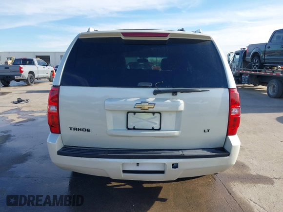 2012 Chevrolet Tahoe Commercial with VIN 1GNLC2E0XCR185593, listed as a IAAI auction lot 41217784 with 150,419 mi miles and . Bid and sale history available at DreamBid. Image 16.