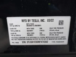2022 Tesla Model S with VIN 5YJSA1E55NF474342, listed as a IAAI auction lot 41870994 with 33,804 mi miles and . Bid and sale history available at DreamBid. Image 9.