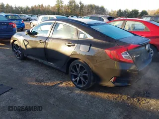 2019 Honda Civic Sport with VIN 2HGFC2F84KH514704, listed as a IAAI auction lot 41225362 with 43,111 mi miles and . Bid and sale history available at DreamBid. Image 3.