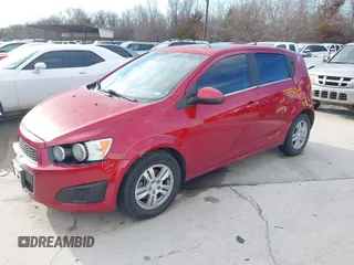 2014 Chevrolet Sonic LT with VIN 1G1JC6SB9E4232389, listed as a IAAI auction lot 41472291 with 165,711 mi miles. Bid and sale history available at carsss.com. Image 2.
