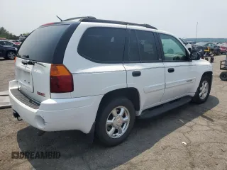 2003 GMC Envoy SLE z VIN 1GKDT13S732228585, wystawiony jako Copart lot #58764565 z przebiegiem 151 107 mil mil oraz Szkoda całkowita • Salvage title. Historia ofert i sprzedaży dostępna na DreamBid. Obrazek 3.