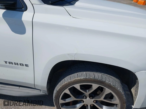 2015 Chevrolet Tahoe LT with VIN 1GNSCBKCXFR552071, listed as a IAAI auction lot 41972157 with 214,738 mi miles and . Bid and sale history available at DreamBid. Image 17.