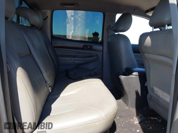 2014 Toyota Tacoma PreRunner with VIN 3TMJU4GN3EM165840, listed as a IAAI auction lot 41666871 with 150,333 mi miles and . Bid and sale history available at DreamBid. Image 8.