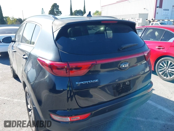 2018 Kia Sportage EX with VIN KNDPN3AC6J7387429, listed as a IAAI auction lot 41833920 with 105,307 mi miles and . Bid and sale history available at DreamBid. Image 3.