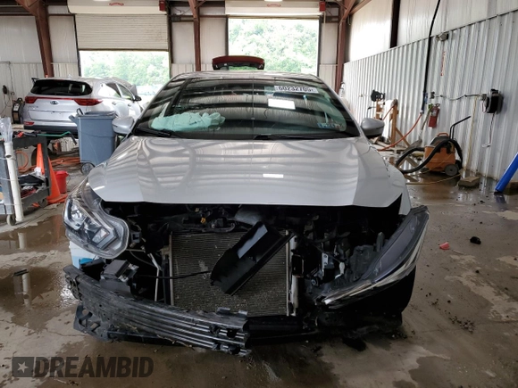 2021 Nissan Versa SV with VIN 3N1CN8EV5ML835699, listed as a Copart auction lot 60232705 with 84,306 mi miles and Salvage title. Bid and sale history available at DreamBid. Image 5.