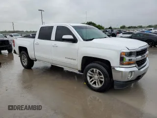 2018 Chevrolet Silverado 1500 LT with VIN 3GCUKREC3JG232849, listed as a Copart auction lot 52029335 with 149,523 mi miles and Clean Title. Bid and sale history available at DreamBid. Image 4.