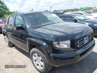 2006 Honda Ridgeline RTL z VIN 2HJYK16596H573159, wystawiony jako IAAI lot #42210214 z przebiegiem 318 126 mil mil oraz . Historia ofert i sprzedaży dostępna na DreamBid. Obrazek 1.