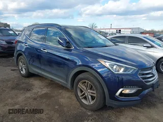2017 Hyundai Santa Fe 2.4L z VIN 5XYZUDLB3HG482999, wystawiony jako IAAI lot #41448847 z przebiegiem 54 771 mil mil oraz . Historia ofert i sprzedaży dostępna na DreamBid. Obrazek 1.