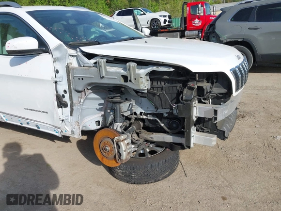 2021 Jeep Cherokee Altitude with VIN 1C4PJMLB6MD162634, listed as a IAAI auction lot 42102564 with 50,551 mi miles and . Bid and sale history available at DreamBid. Image 6.