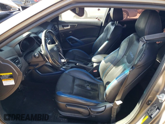 2014 Hyundai Veloster Turbo with VIN KMHTC6AE2EU210063, listed as a Copart auction lot 79243924 with 130,551 mi miles and Salvage Title. Bid and sale history available at carsss.com. Image 7.