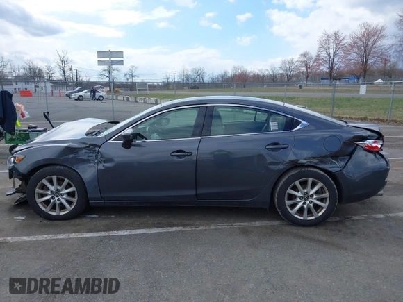 2014 Mazda 6 i Sport with VIN JM1GJ1U51E1111018, listed as a IAAI auction lot 41875461 with 253,755 mi miles and . Bid and sale history available at DreamBid. Image 14.