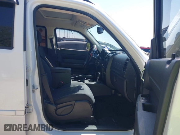 2011 Dodge Nitro Heat with VIN 1D4PT4GX9BW587284, listed as a IAAI auction lot 41998357 with 100,366 mi miles and . Bid and sale history available at DreamBid. Image 5.