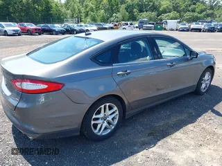 2013 Ford Fusion SE with VIN 3FA6P0H70DR120514, listed as a IAAI auction lot 40066832 with 138,252 mi miles. Bid and sale history available at carsss.com. Image 4.