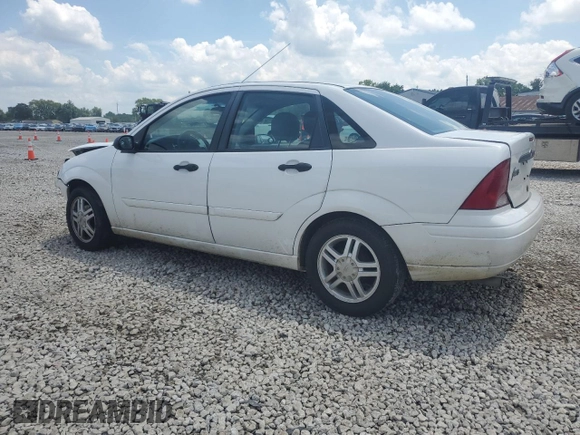 2003 Ford Focus SE with VIN 1FAFP34353W231334, listed as a Copart auction lot 63844205 with 86,601 mi miles and Salvage title. Bid and sale history available at DreamBid. Image 2.