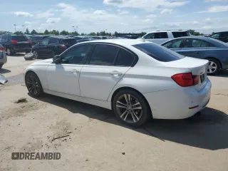 2013 BMW 3 Series 328i xDrive with VIN WBA3B3C58DJ810943, listed as a Copart auction lot 61365765 with 151,991 mi miles and Clean title. Bid and sale history available at DreamBid. Image 2.