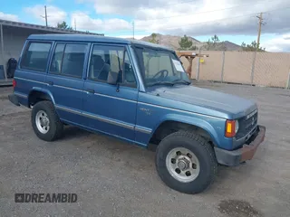 1991 Mitsubishi Montero z VIN JA4GJ31S0MJ006906, wystawiony jako IAAI lot #41782268 z przebiegiem 184 605 mil mil oraz . Historia ofert i sprzedaży dostępna na DreamBid. Obrazek 1.