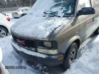 2002 GMC Safari z VIN 1GTDL19X12B504207, wystawiony jako IAAI lot #41524580 z przebiegiem Nie podano mil oraz . Historia ofert i sprzedaży dostępna na DreamBid. Obrazek 6.