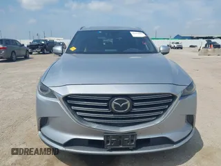 2016 Mazda CX-9 Signature with VIN JM3TCBEY9G0117785, listed as a IAAI auction lot 42331883 with 115,096 mi miles and . Bid and sale history available at DreamBid. Image 12.