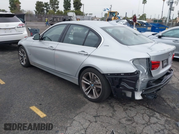 2017 BMW 3 Series 330e iPerformance with VIN WBA8E1C59HK480327, listed as a IAAI auction lot 41809395 with 74,919 mi miles. Bid and sale history available at carsss.com. Image 3.