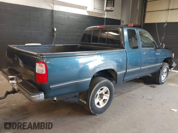 1996 Toyota T100 DX with VIN JT4UN22D2T0020138, listed as a IAAI auction lot 41912550 with 164,007 mi miles. Bid and sale history available at carsss.com. Image 4.