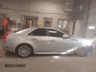 2012 Cadillac CTS Premium z VIN 1G6DS5E33C0139591, wystawiony jako IAAI lot #41985026 z przebiegiem 151 810 mil mil oraz . Historia ofert i sprzedaży dostępna na DreamBid. Obrazek 13.