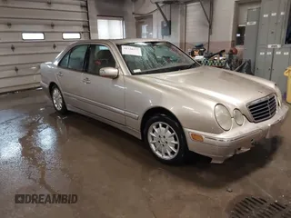 2000 Mercedes-Benz E-Class with VIN WDBJF65JXYB051088, listed as a IAAI auction lot 41726377 with 280,928 mi miles. Bid and sale history available at carsss.com. Image 1.