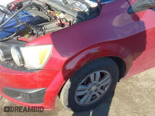 2014 Chevrolet Sonic LT with VIN 1G1JC6SH6E4215294, listed as a IAAI auction lot 41282441 with 107,583 mi miles. Bid and sale history available at carsss.com. Image 5.