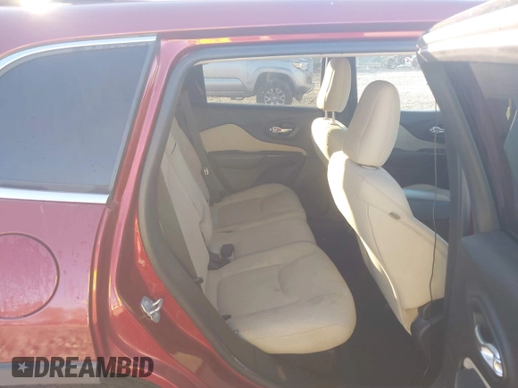 2016 Jeep Cherokee Latitude with VIN 1C4PJMCB2GW153972, listed as a IAAI auction lot 40579489 with 130,176 mi miles. Bid and sale history available at carsss.com. Image 8.