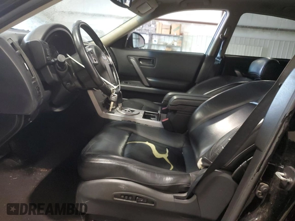 2004 Infiniti FX with VIN JNRAS08U94X107387, listed as a Copart auction lot 69709264 with 255,861 mi miles and Salvage Title. Bid and sale history available at DreamBid. Image 7.