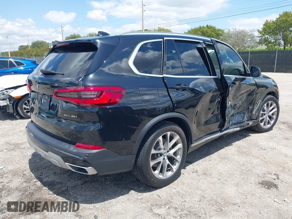 2019 BMW X5 xDrive40i with VIN 5UXCR6C59KLL23735, listed as a IAAI auction lot 41999791 with 31,072 mi miles. Bid and sale history available at carsss.com. Image 4.