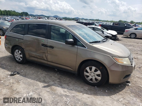 2012 Honda Odyssey LX с VIN 5FNRL5H29CB081071, выставлен на аукционе Copart как лот 56751545 с пробегом 233 240 миль миль и Списание • Salvage title. История ставок и продаж доступна на DreamBid. Изображение 4.