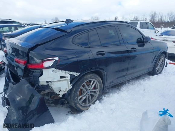 2021 BMW X4 M40i with VIN 5UX2V5C05M9H02711, listed as a IAAI auction lot 41675953 with 26,652 mi miles. Bid and sale history available at carsss.com. Image 4.
