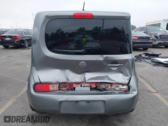 2010 Nissan Cube S z VIN JN8AZ2KR9AT153627, wystawiony jako IAAI lot #42352451 z przebiegiem 184 305 mil mil oraz . Historia ofert i sprzedaży dostępna na DreamBid. Obrazek 6.