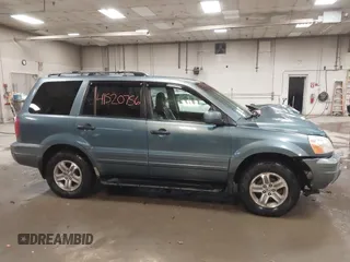 2005 Honda Pilot EX-L with RES with VIN 2HKYF18615H515907, listed as a IAAI auction lot 41520756 with 172,939 mi miles. Bid and sale history available at carsss.com. Image 13.