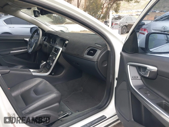 2014 Volvo S60 T5 с VIN YV1612FS0E1286021, выставлен на аукционе IAAI как лот 41708156 с пробегом 115 376 миль миль и . История ставок и продаж доступна на DreamBid. Изображение 5.