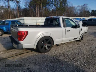 2021 Ford F-150 XL with VIN 1FTMF1C57MKD79392, listed as a Copart auction lot 87130764 with 29,241 mi miles and Salvage title. Bid and sale history available at DreamBid. Image 3.
