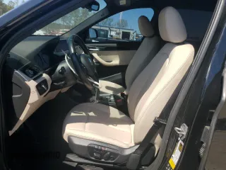 2021 BMW X1 xDrive28i z VIN WBXJG9C07M5S73464, wystawiony jako Copart lot #50374525 z przebiegiem 117 828 mil mil oraz Tytuł czysty. Historia ofert i sprzedaży dostępna na DreamBid. Obrazek 7.
