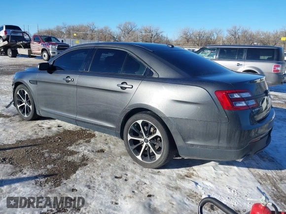 2015 Ford Taurus Limited with VIN 1FAHP2J85FG165823, listed as a IAAI auction lot 41315889 with 134,165 mi miles. Bid and sale history available at carsss.com. Image 3.