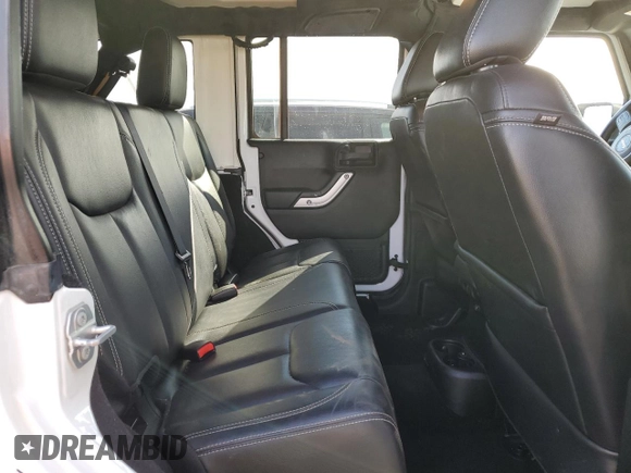 2016 Jeep Wrangler Unlimited Rubicon z VIN 1C4HJWFG6GL315448, wystawiony jako Copart lot #48980755 z przebiegiem 111 612 mil mil oraz Szkoda całkowita • Salvage title. Historia ofert i sprzedaży dostępna na DreamBid. Obrazek 11.